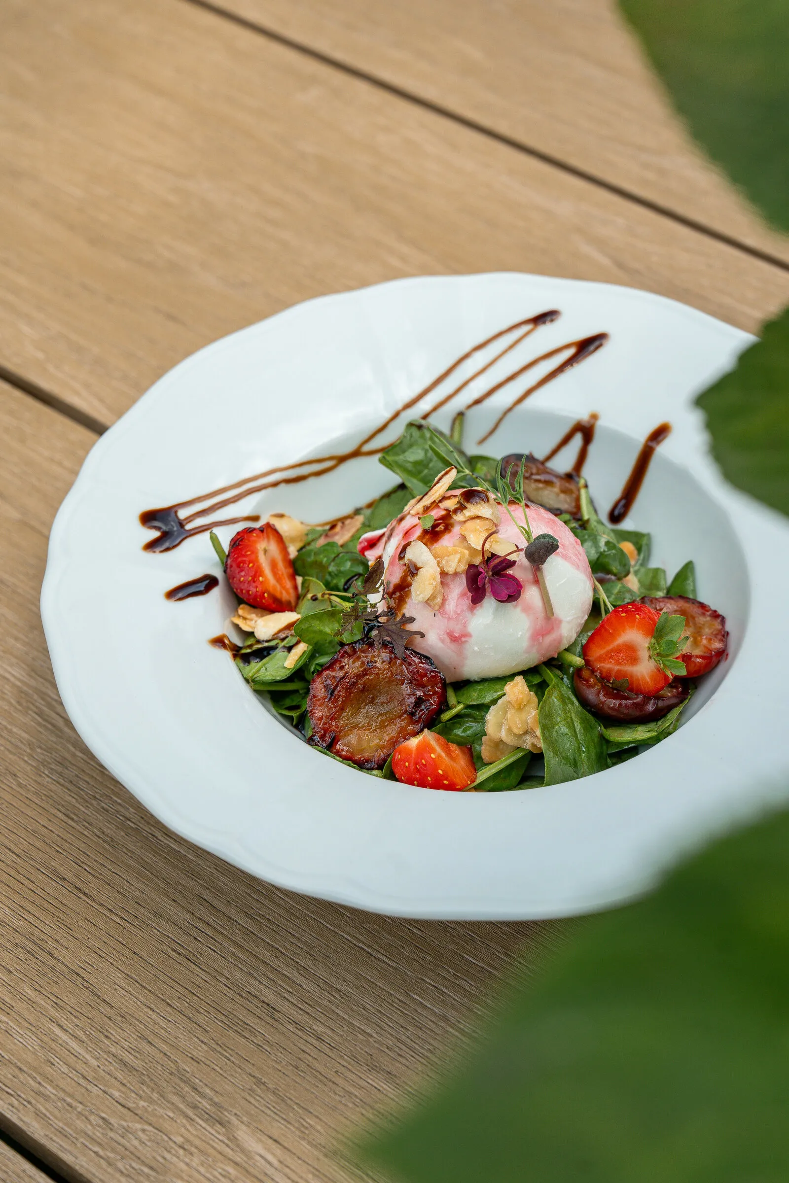 Buffalo mozzarella with baby spinach and strawberries at ÉTÉ